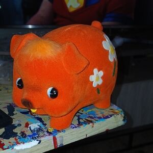 Orange Piggy Bank with Floral Design